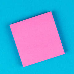 pink post for notice on colorful blue  background