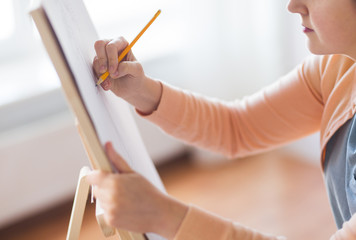 artist with pencil drawing picture at art studio