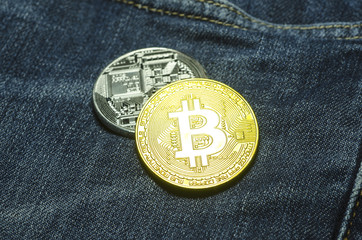 Bit coin in the pocket of jeans