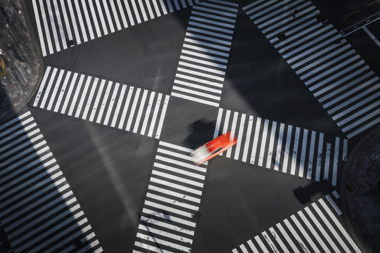 Blurred motion of car on road in city