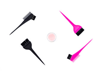 Dye hair in beauty salon. Set of brushes on white background top view