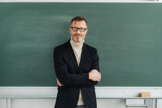 Confident middle-aged male teacher or professor