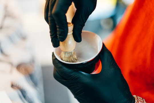 Barber with foam and brush