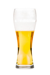 Tall beer glass almost full with lager beer