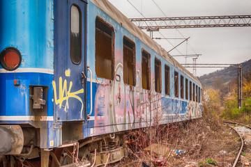 Fototapeta premium Belgrade, Serbia March 21, 2016: Abandoned and destroyed trains