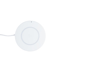 White wireless charger for mobile phone on white background or isolated