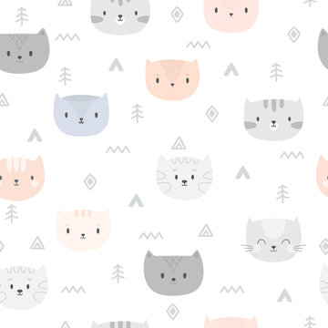 Tribal seamless pattern with cartoon cats. Abstract geometric art print. Hand drawn ethnic background with cute animals