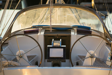 Controls wheels of yacht