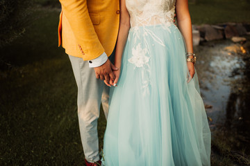 Couple holding hands