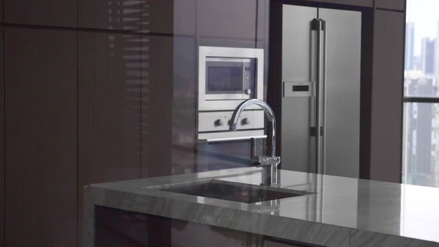 Modern nordic kitchen in loft apartment with city view. Conterporaty design concept.