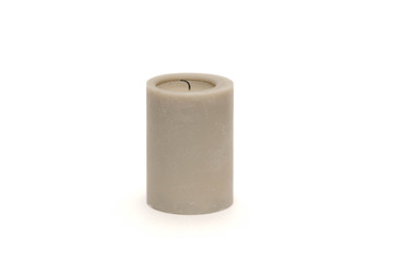 Single gray candle against a white background