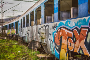 Fototapeta premium Belgrade, Serbia March 21, 2016: Abandoned and destroyed trains