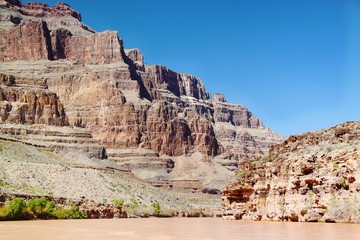 Fototapeta premium Gorgeous view on Colorado river, Grand Canyon, Arizona . Blue sky background. Beautiful nature landscape backgrounds.