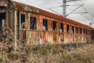 Fototapeta premium Belgrade, Serbia March 21, 2016: Abandoned and destroyed trains