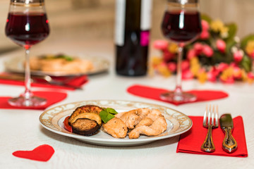 Romantic dinner for two with wine,meat and flowers