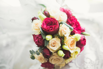 Wonderful luxury wedding bouquet of different flowers
