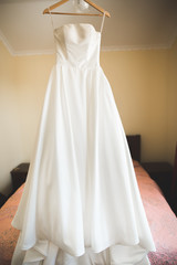 The perfect wedding dress in the room of the bride