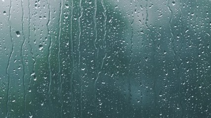 real rain drops sliding on window glass - Powered by Adobe