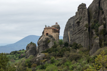 Fototapeta na wymiar Beautiful scenic view of orthodox monastery in the Greece mountains, Meteora