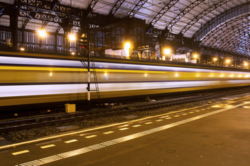 Fototapeta na wymiar Train with speed on station Haarlem