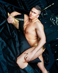 attractive muscular striptease dancer wearing underwear
