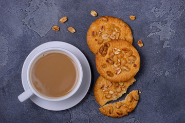 Coffee with milk and sweet cookies