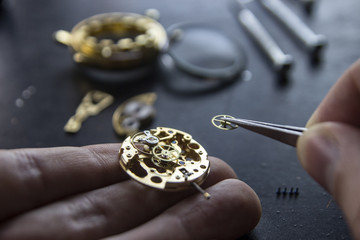 Process of installing a part on a mechanical watch, watch repair