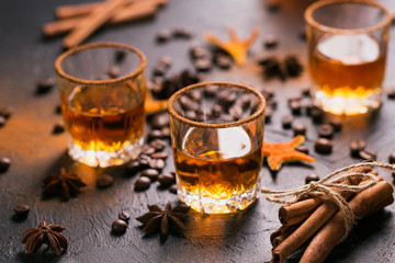 Whiskey, brandy or liquor, spices, anise stars, coffee beans, ci