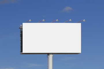 Blank billboard against blue sky