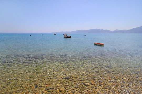      Fishing boats in the  blue sea water 
