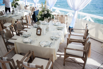 Catering table set service with food and drink at restaurant