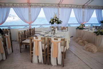 Catering table set service with food and drink at restaurant