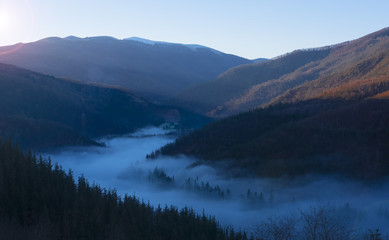 Mist of sea, Sea of clouds on sunrise with ray lighting in valley of Goizueta