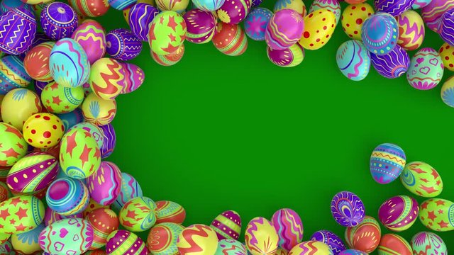 Easter eggs on solid background.  Colorful Easter eggs form a frame, you can put there your inscription or logo . Green background.