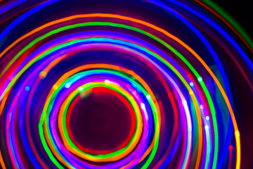 Neon LED long exposure on black background