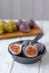 Fresh and ripe figs in a frying pan.