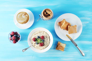 Breakfast oatmeal on a blue background