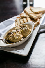 hummus and grilled pita appetizer