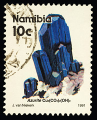 Azurit crystals on postage stamp