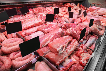 Variety of fresh meat in supermarket