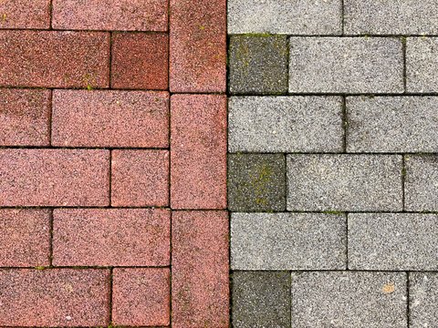 Fototapeta Color wet pavement. Urban background and texture red and grey bricks wall floor