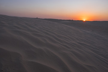 Fototapeta na wymiar Beautiful sand dunes in the Sahara desert at sunset