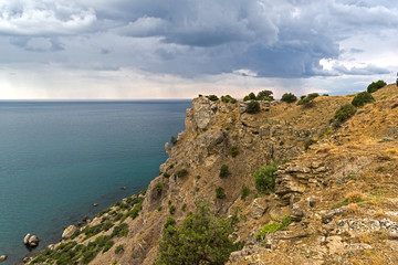 Fototapeta na wymiar View from the top of the mountain towards the sea. Bad weather. Crimea.