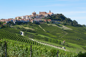 Fototapeta na wymiar La Morra town in Italy surrounded by vineyards in a sunny day