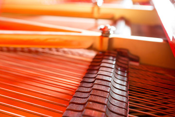Grand piano strings. Piano inside with the shallow depth of field.