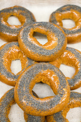 Appetizing bagels with poppy seeds