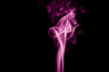 Fototapeta na wymiar Purple smoke on black background