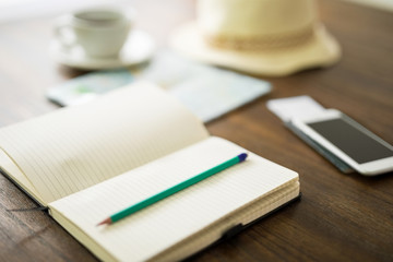 Blank notebook with pencil