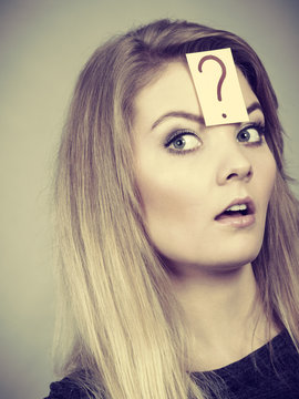 Closeup of woman thinking face expression