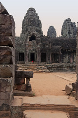 Fototapeta premium Bayon Temple, Angkor, Cambodia. The Bayon is a well-known and richly decorated Khmer temple at Angkor in Cambodia, completed in 1219.